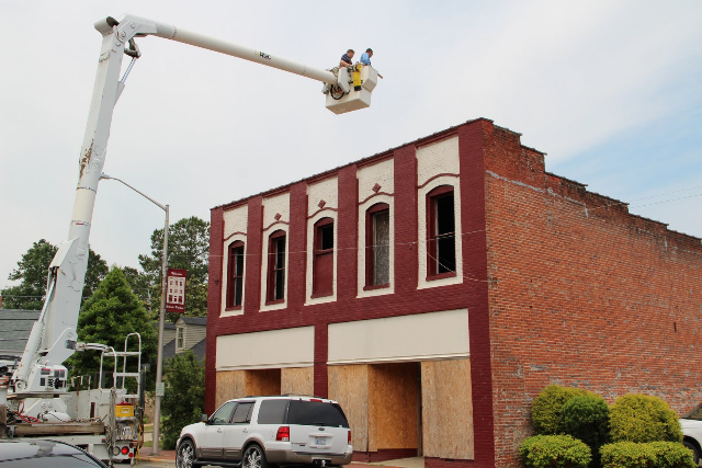 roof-inspection-over-burned-out-building